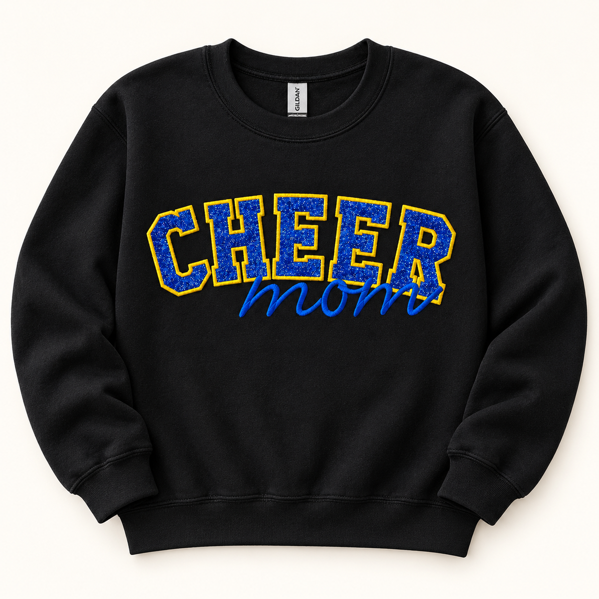 Cheer Mom Glitter Appliqué Sweatshirt | School Spirit Apparel — styled product mockup on cream background