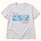 Embroidered He is Risen Indeed Easter Shirt, Faith Based Religious Apparel — styled product mockup on cream background
