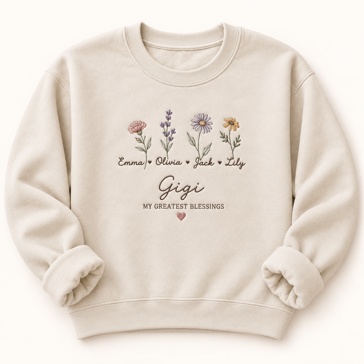 Custom Gigi Birth Flower Embroidered Crewneck – Names & Flowers — styled product mockup on cream background